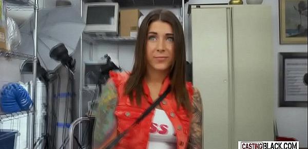  A petite tattooed teen is on her knees waiting to be fucked by a big black dick.